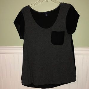 Small grey and black tee with front pocket